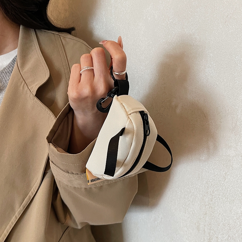 حقائب صغيرة لطيفة لسماعات الأذ - مراجعة Mini Backpack Purse وسعره